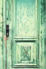 Old and weathered green door texture
