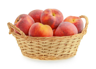 peaches in basket isolated