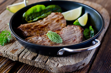 Baked meat with herbs