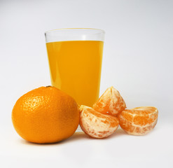 Tangerine and glass of juice 2