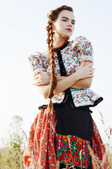 Young peasant woman, dressed in Hungarian national costume