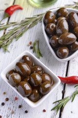 Marinated olives on table close-up