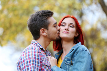 Loving couple in autumn park