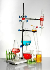 Laboratory glassware on light background