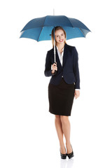 Businesswoman holding an umbrella