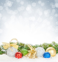 Fototapeta na wymiar Christmas colorful decor and snow fir tree