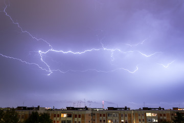 Naklejka na ściany i meble Storm with some lightning strike in the sky