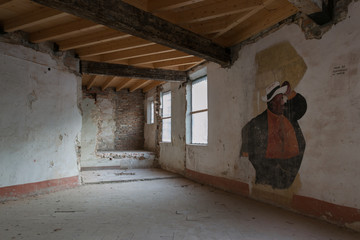 Fototapeta premium Interiors of an abandoned madhouse in the downtown