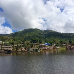 Fototapeta na wymiar Village beside lake