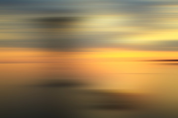 abstract warm yellow background motion blur