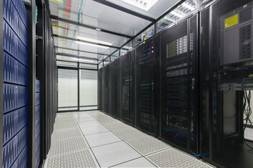 Modern interior of server room Data Center.