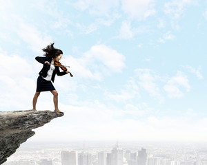Businesswoman with violin