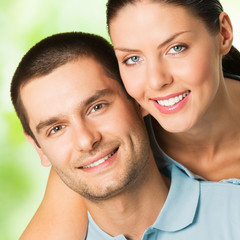 Happy smiling attractive couple, outdoor