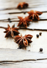 Star anise on wooden background
