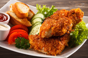 Fried chicken nuggets and vegetables