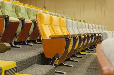 empty chairs in theatre or conference hall.