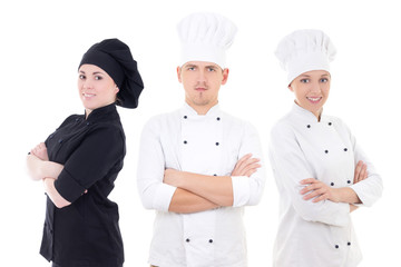 cooking concept - young chefs team isolated on white