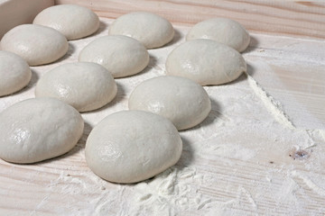 Fototapeta na wymiar Dough balls, italian pizza