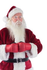 Santa Claus wears boxing gloves