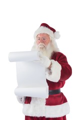 Naklejka premium Santa Claus reads a list