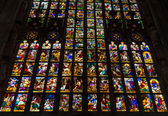 Colorful stained-glass windows in Duomo (Cathedral) in Milan.