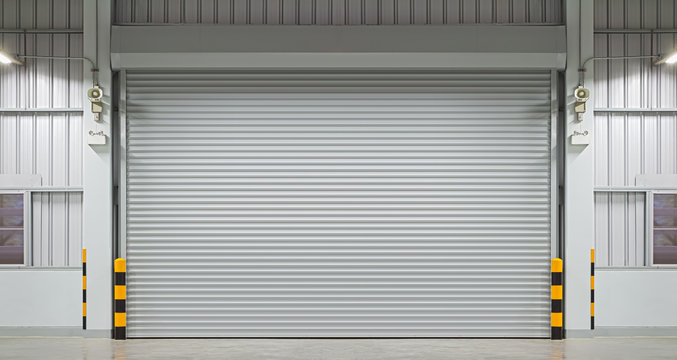 Roller Door Or Roller Shutter. Also Called Security Door Or Security Shutter With Automatic System. For Protection Industrial Building I.e. Factory, Warehouse, Hangar, Workshop, Store, Hall Or Garage.