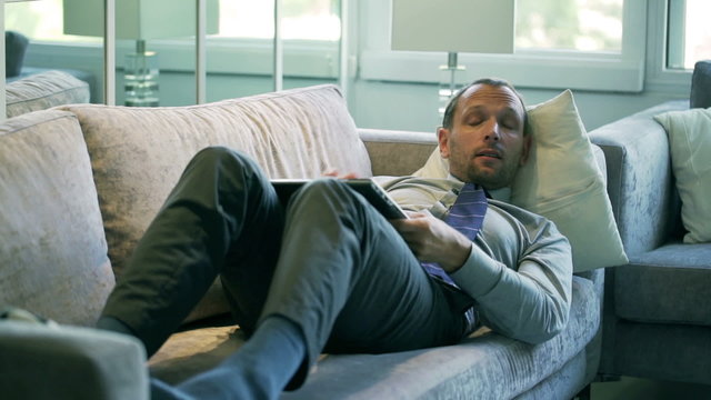 Businessman Finish Working On Laptop And Going To Sleep