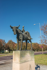 Statue of a naked man on bull in the downtown of Magdeburg, Germ