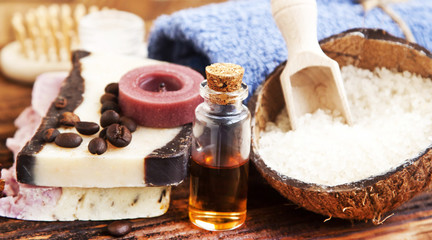 Spa Setting with Essential Oil Bottle, Natural Soap and Sea Salt