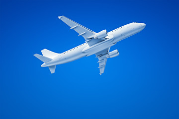 Naklejka na ściany i meble Airplane in the blue sky