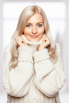 Blonde Woman In Cashmere Sweater