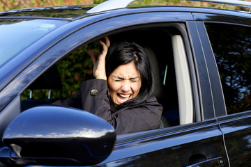 Woman in car shouting because of accident