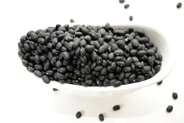 A Fancy White Bowl Filled with Black Beans