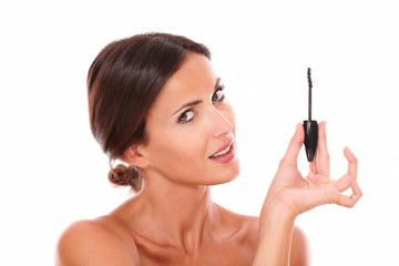 Obraz premium Mature sensual woman with eyelash brush