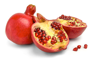 Whole, half and seeds of pomegranate