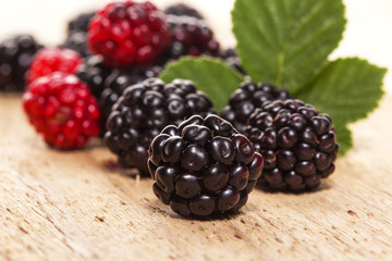 Blackberries on wooden background