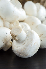 Fresh whole champignons close up