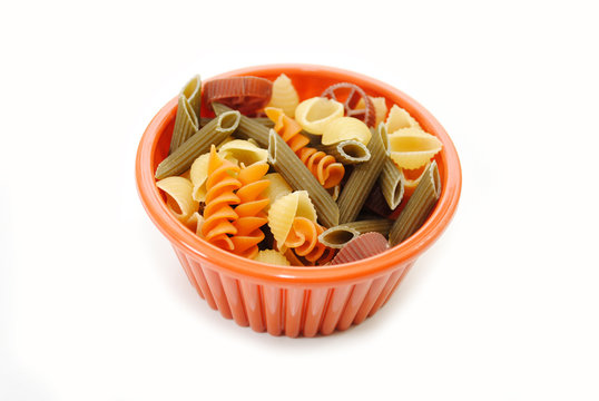 Orange Bowl with Fancy Pasta Isolated on White