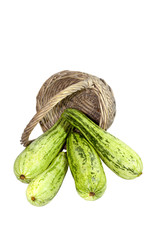 Variegated Baby Marrows Spilling from Upturned Wicker Basket