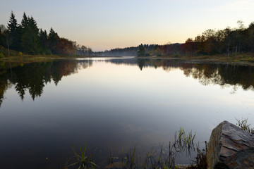 Obraz na płótnie Canvas Calm Mountain Lake at Dawn