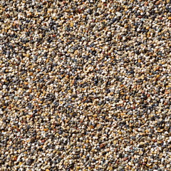 Brown pebble stone floor background seamless and texture
