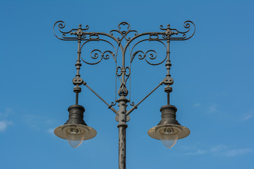 Fototapeta na wymiar Classic Old Street Lamp On Blue Sky