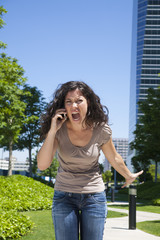 furious woman shouting phone