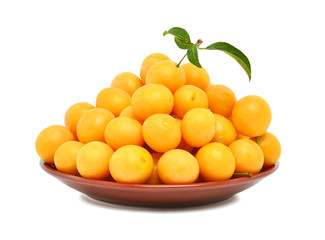 Yellow cherry plum on the plate
