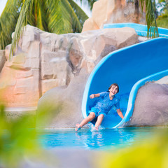 Child on water slide
