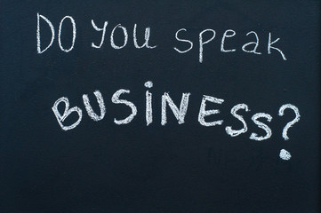 Obraz premium Do you speak business? message written on blackboard