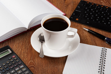 business still life with cup of black coffee