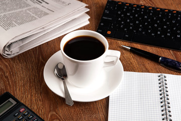business still life with cup of black coffee