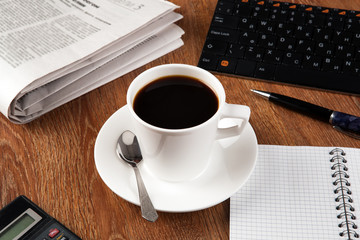 business still life with cup of black coffee