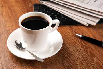 cup of coffee and the newspaper